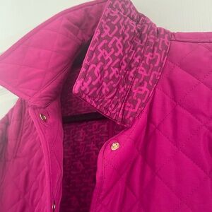 Chico's dahlia color tailored classic mid-length with striking quilted lining.